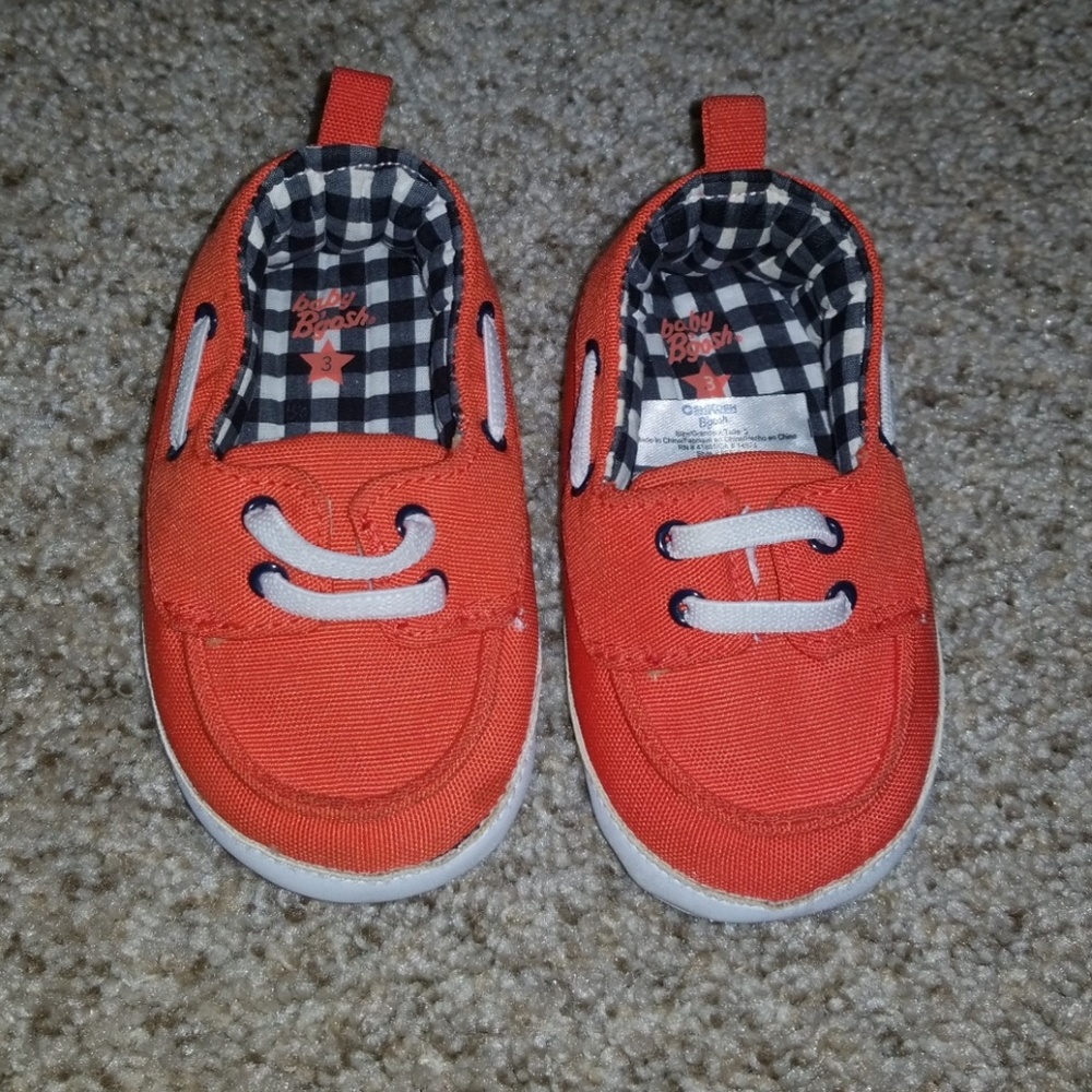 Orange infant shoes